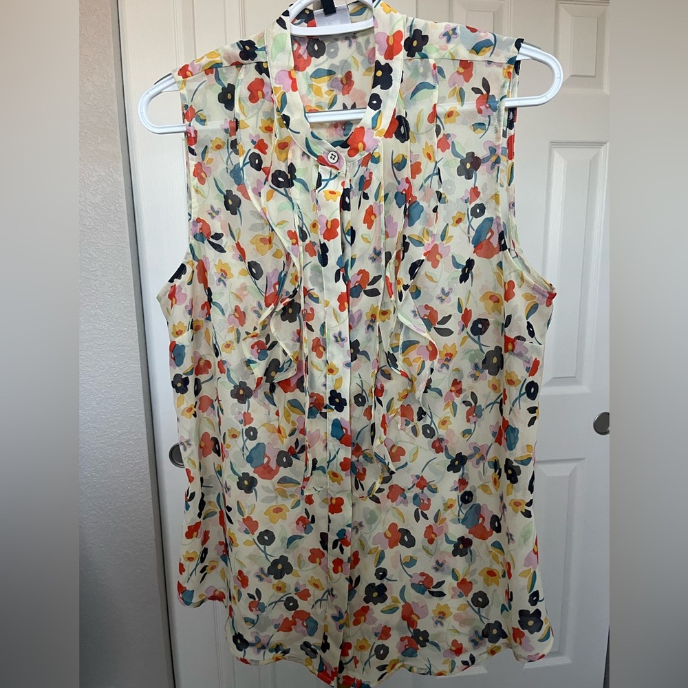 CAbi Women’s Tux Ruffle Floral Sheer Sleeveless Blouse. Multi Color Medium